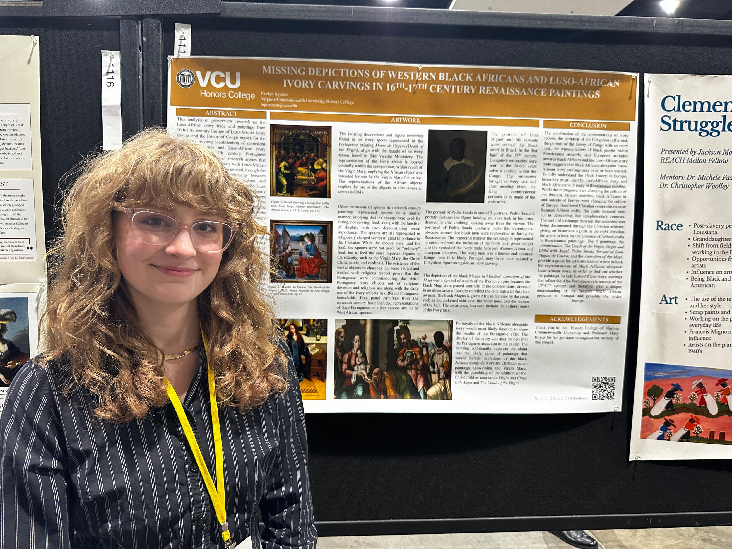 A woman in glasses stands in front of a research poster board.