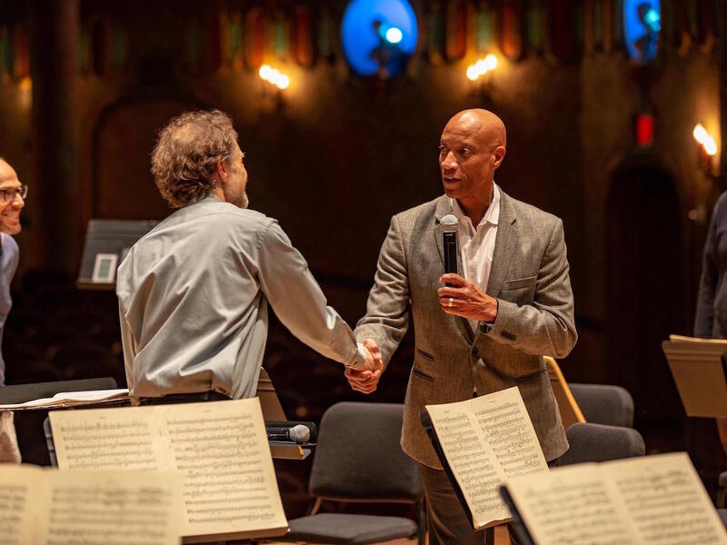 VCU School of Business Dean Ed Grier, right, and then-Richmond Symphony music director Steven Smith at the Dominion Energy Center for the Performing Arts in 2019