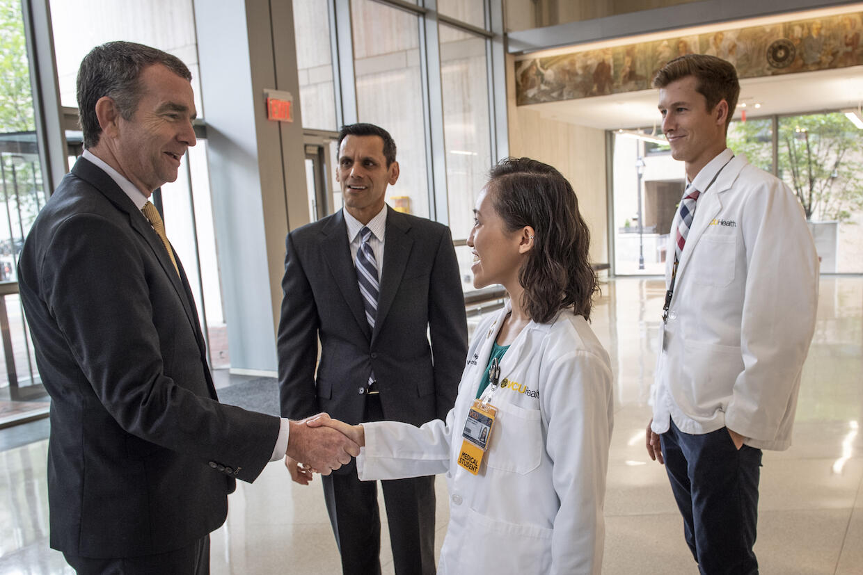 Northam and VCU President Michael Rao, Ph.D., meet with School of Medicine students. (Photo by Allen Jones, University Relations)