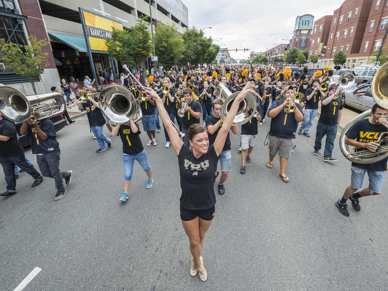 VCU students parade down West Broad Street in 2014 as part of the Ram Spirit Walk.