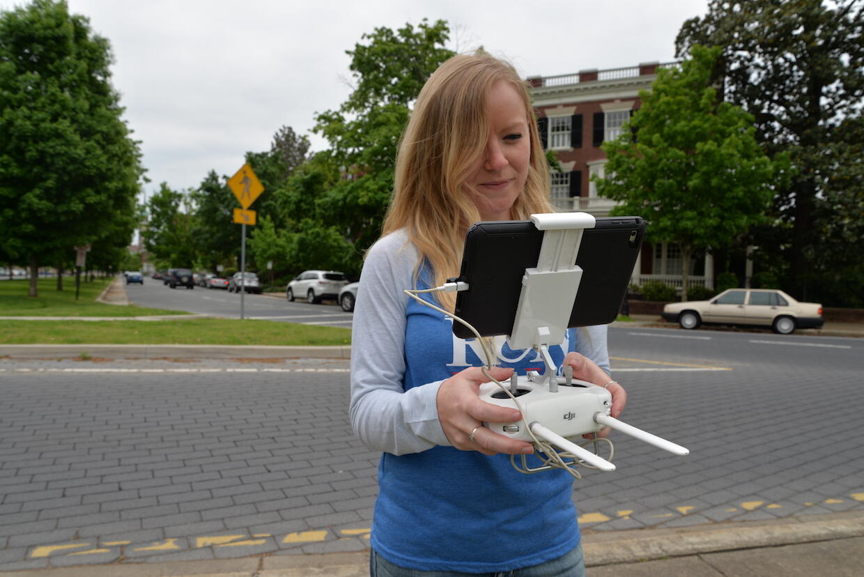 Ashley McCuistion, digital curator and public outreach coordinator of the Fairfield Foundation, pilots a drone on Monument Avenue.
