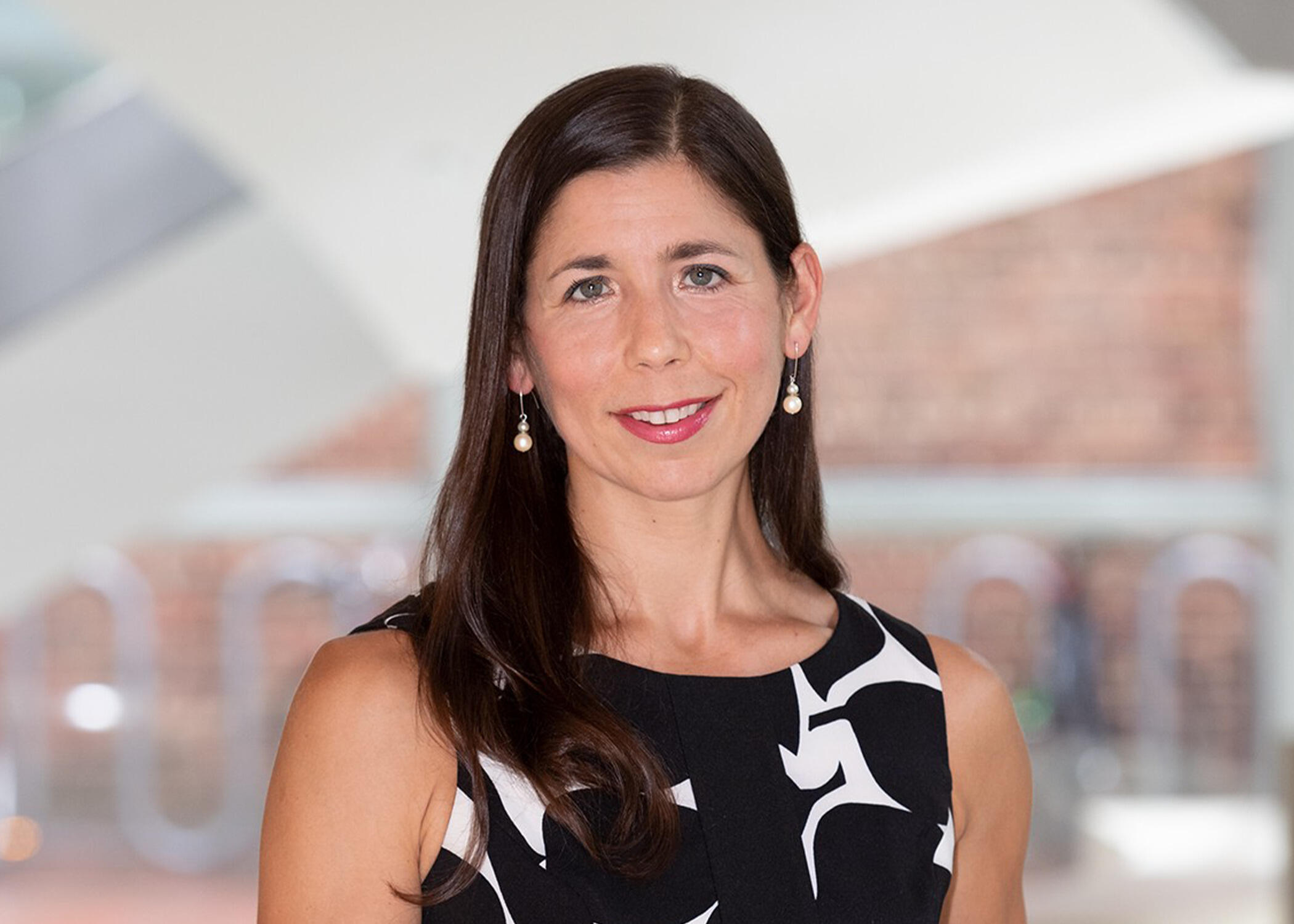 A photo of a woman from the shoulders up 