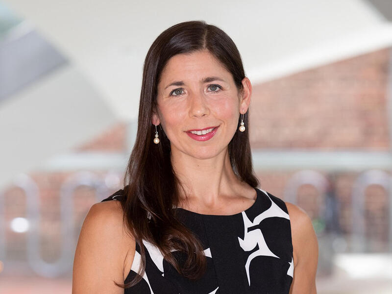 A photo of a woman from the shoulders up 