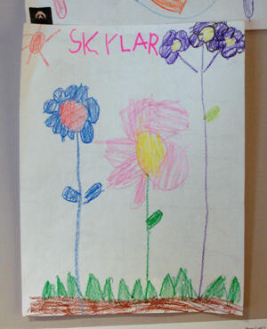 While waiting for her cleaning, a young patient drew this picture for Dr. Heath Whitfield, a first year resident volunteering in the clinic.