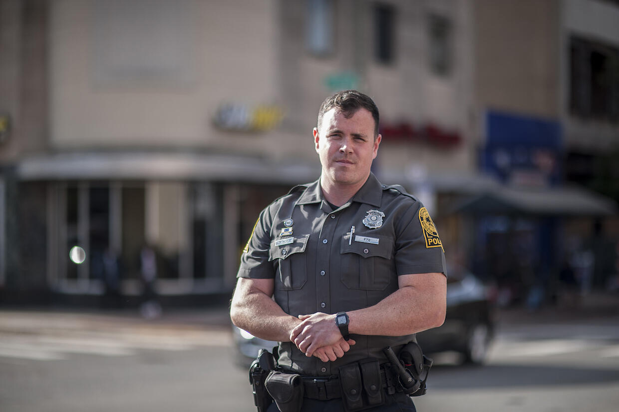 VCU Police Officer Nicholas Finch standing at the intersection of Fourth and East Broad streets in Richmond