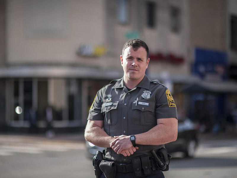 VCU Police Officer Nicholas Finch standing at the intersection of Fourth and East Broad streets in Richmond