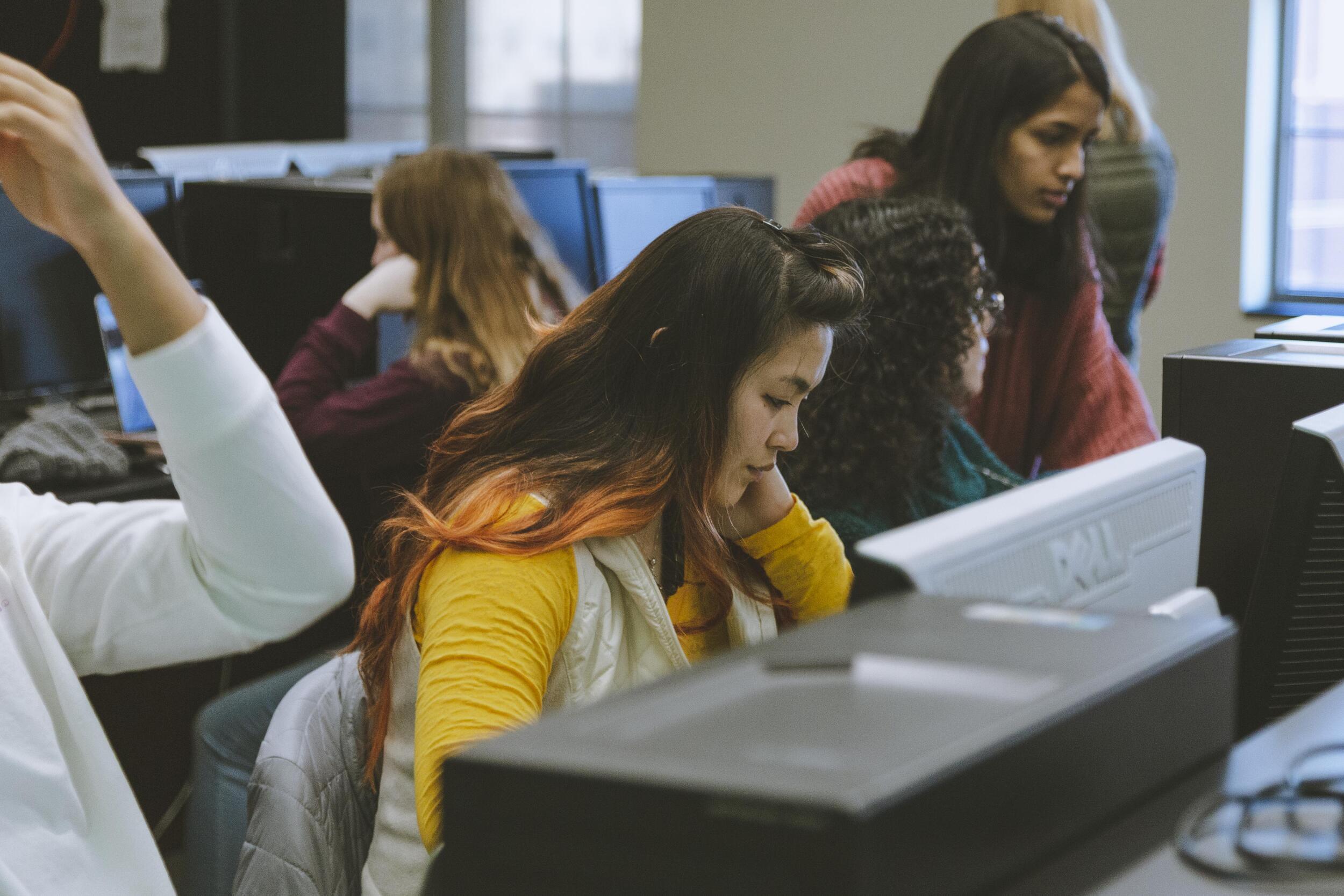 Students in a laboratory setting.