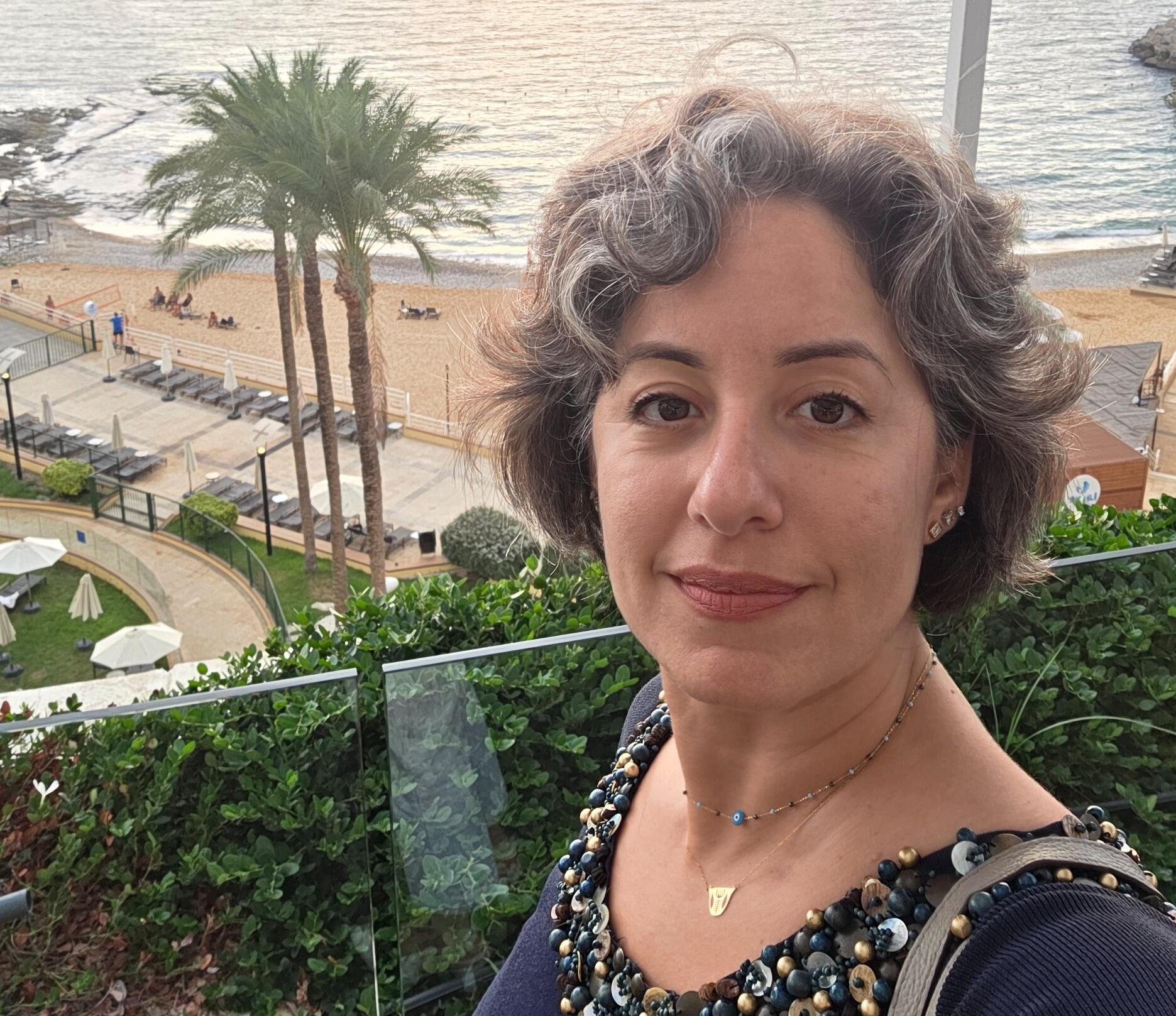 A photo of a woman from the shoulders up