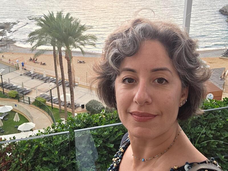 A photo of a woman from the shoulders up