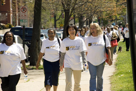 Members of the VCU Staff Senate and Richmond community laugh as they round Monroe Park during the 2009 Virginia’s Caring University Scholarship Walk-A-Thon. Photo by Melissa Gordon, VCU Communications and Public Relations