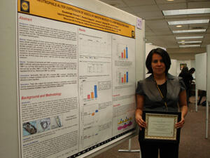 Guadalupe Estrada, Ph.D., fellow in the VCU Department of Obstetrics and Gynecology, features her research poster titled “Neutrophils Alter Expression of Vascular Smooth Muscle Collagen Regulating Genes,” while displaying her certificate for the Elizabeth Fries Young Investigator Award. Image courtesy of Sabrina Walters.