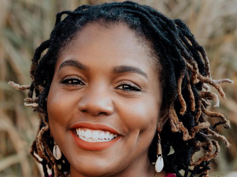A headshot of Danielle Apugo, Ph.D., assistant professor in the VCU School of Education, studies the educational experiences, epistemologies, culture, resistance and intellectual uprising of Black women and girls in the U.S.