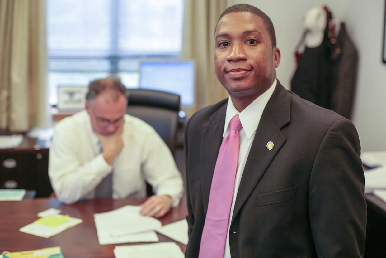 Marc Cheatham standing in U.S. Sen. Tim Kaine's office.