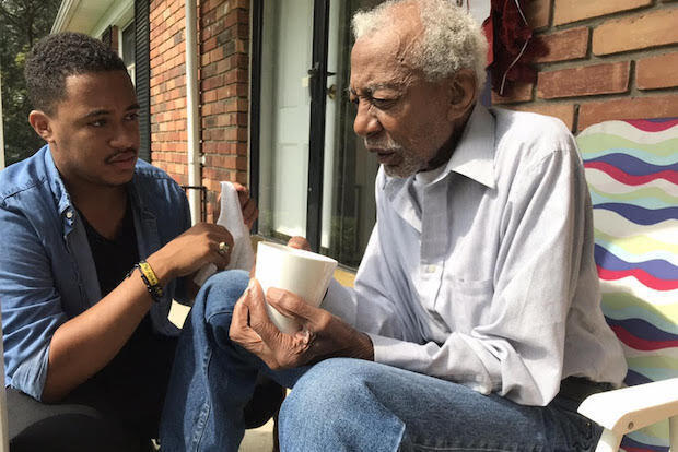 Jordan Howard Thomas, left, with his grandfather, Howard Belton.