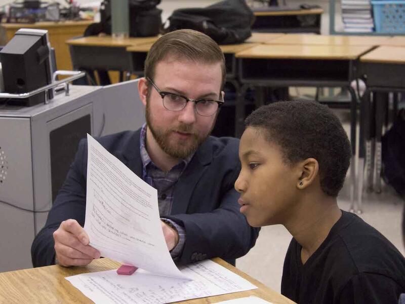 RTR graduate Jonathan Walker with a student.