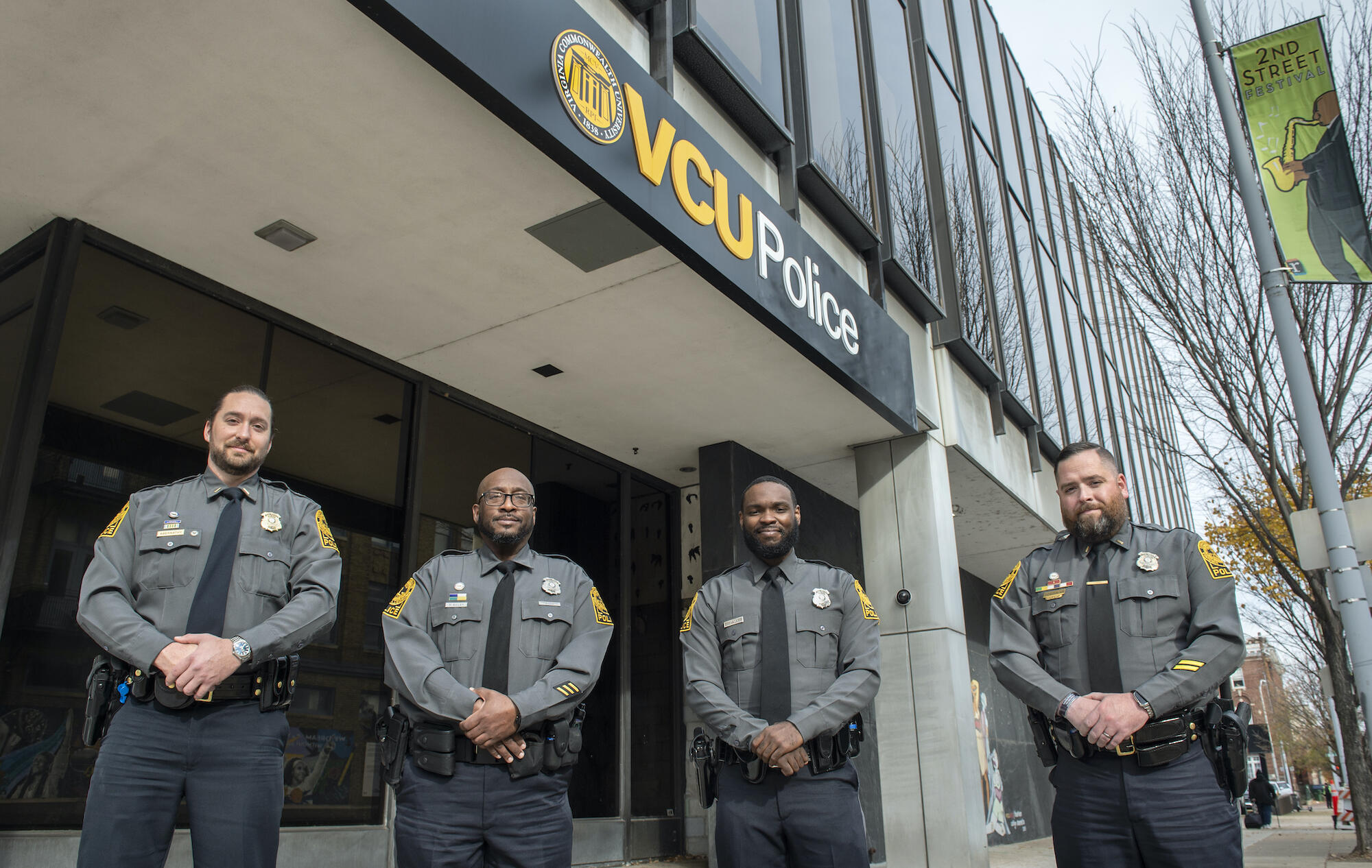 From left: VCU Police officers Joel Abernathy, Mark Bailey, Josiah Evans, and Ian McAllister in front of VCUPD headquarters.