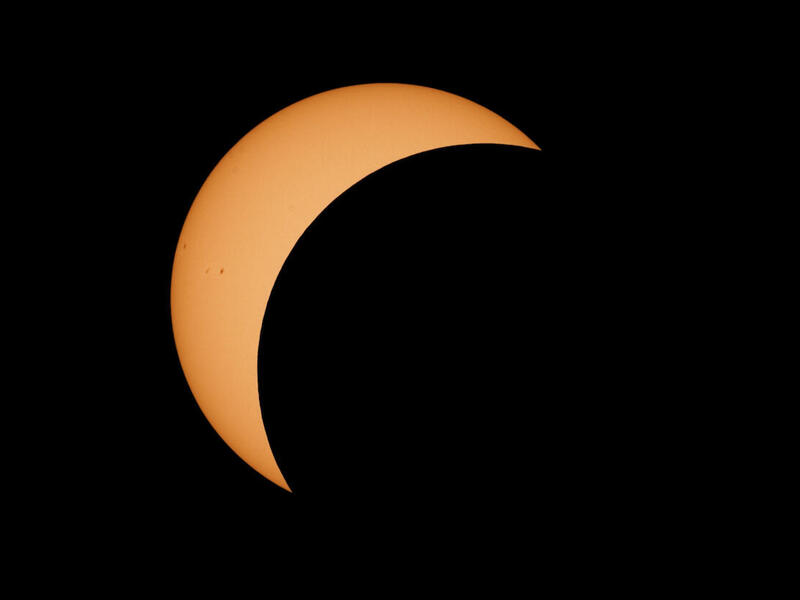 A photo of a solar eclipse. 