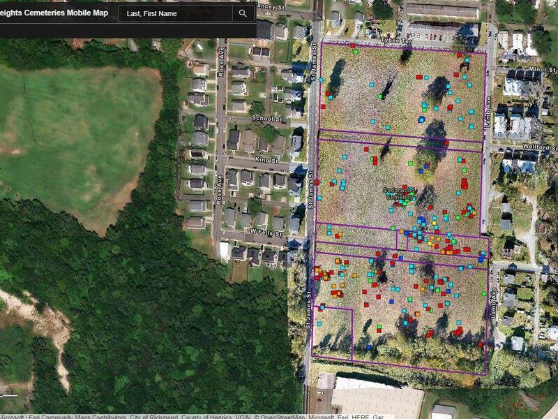 An areal view of the cometery with red and blue markers. 