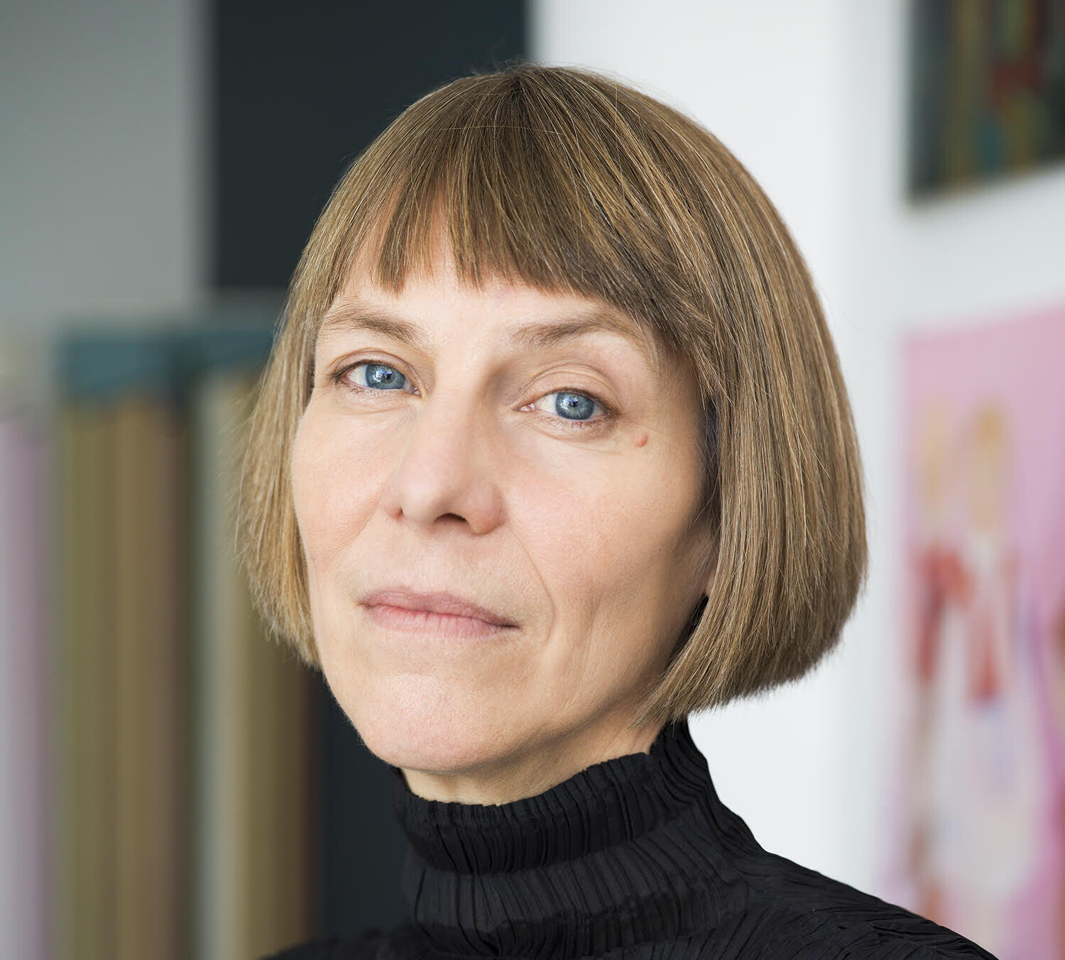 A woman in a black top.