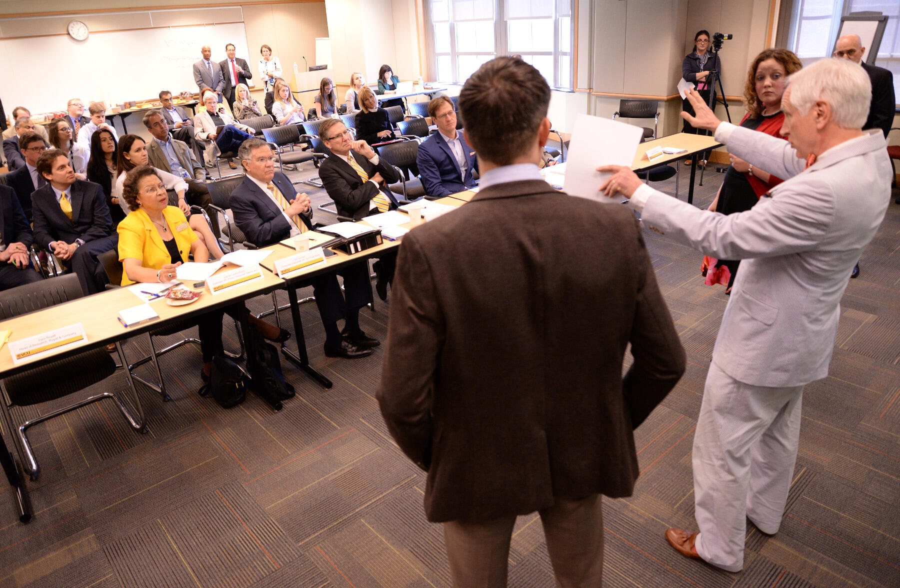 Stephen Day, director of the VCU Center for Economic Education, Professor Edward Millner, Ph.D. and Associate Professor Alisa Brink, Ph.D., present a pitch.